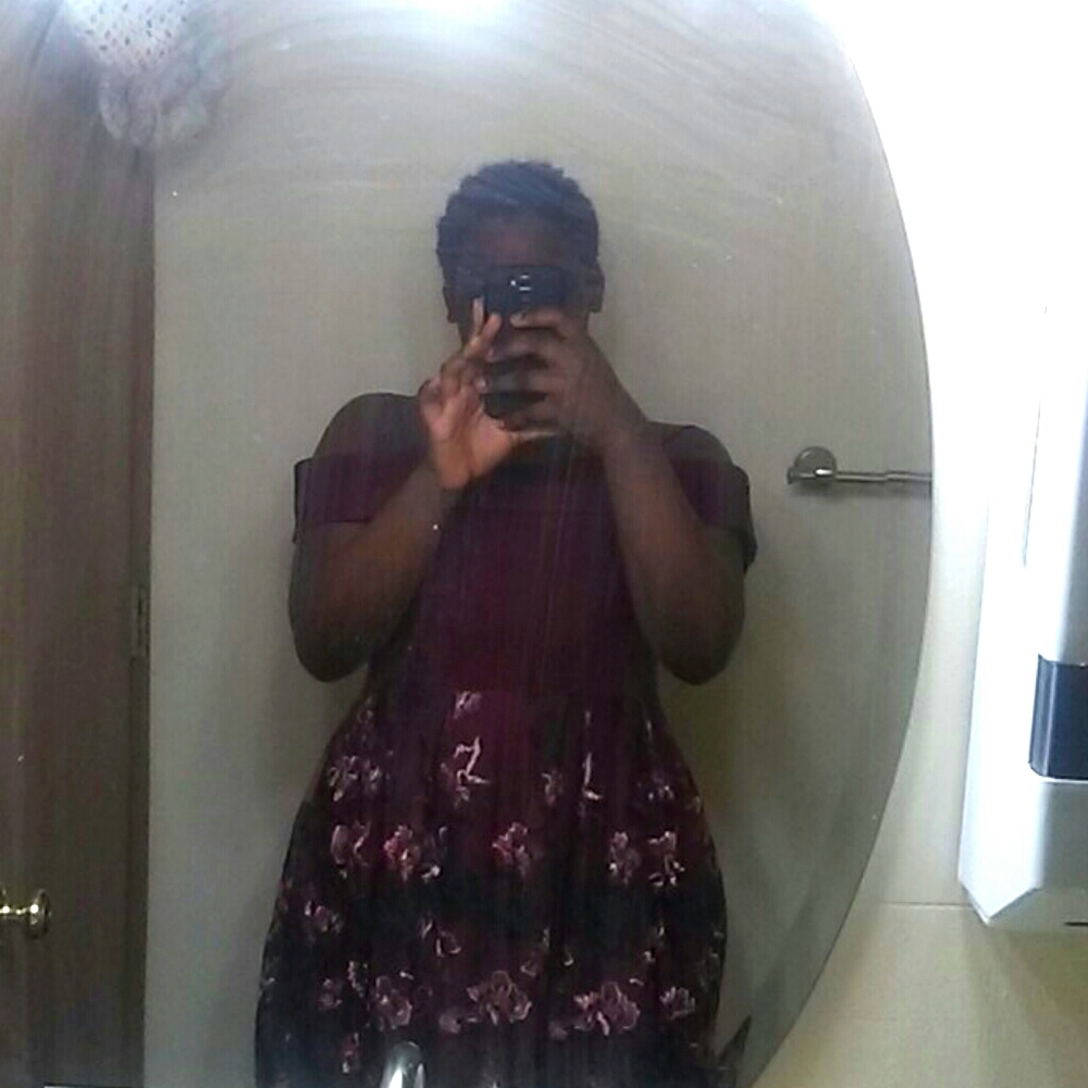 This a red flower dress